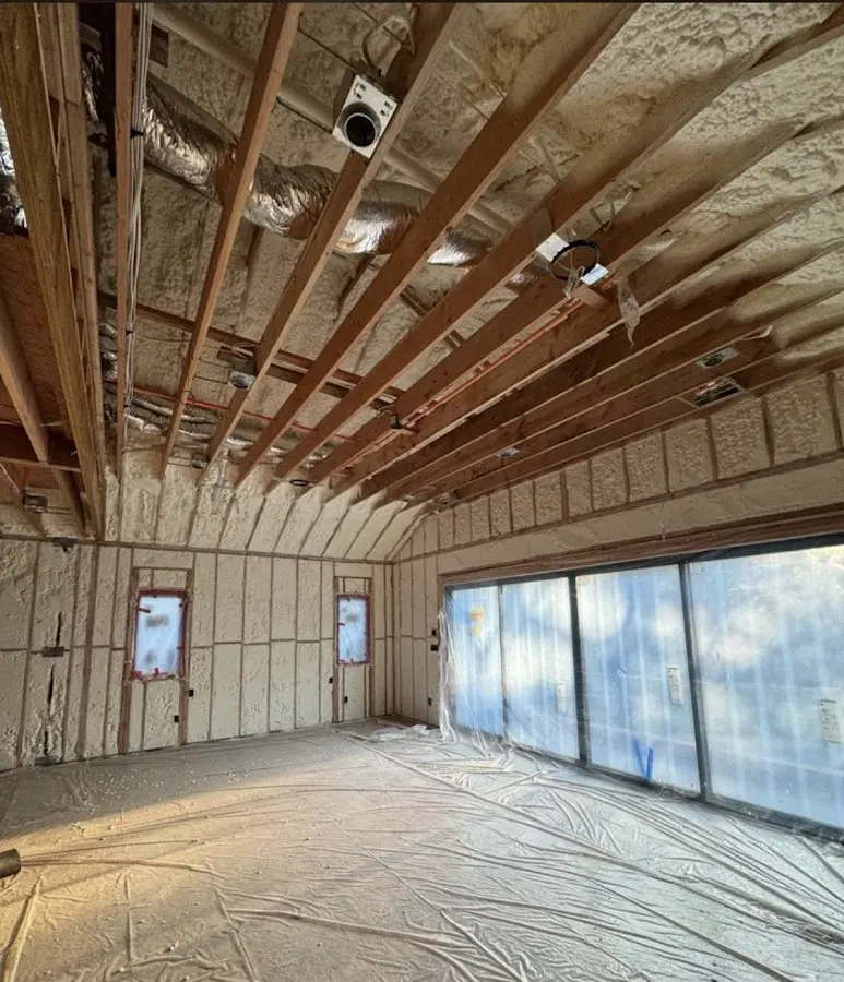 Interior walls and ceiling insulated with spray foam during new construction in Grinnell